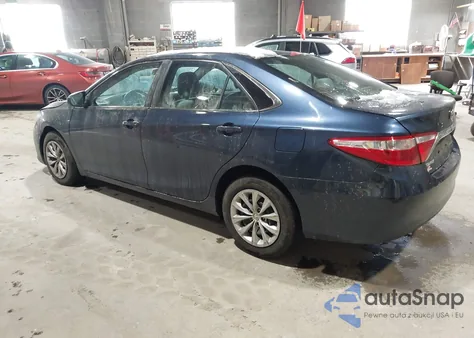 2015 Toyota Camry Le z USA, uszkodzony, nr VIN 4T4BF1FK5FR469075
